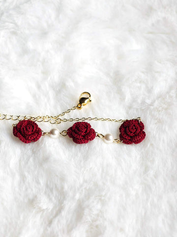 Handmade bracelet with three burgundy roses in micro-crochet