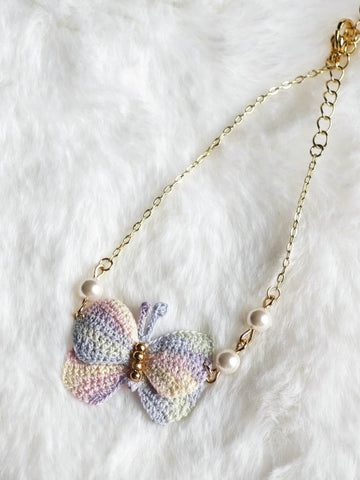 Handmade bracelet with butterfly in micro-crochet