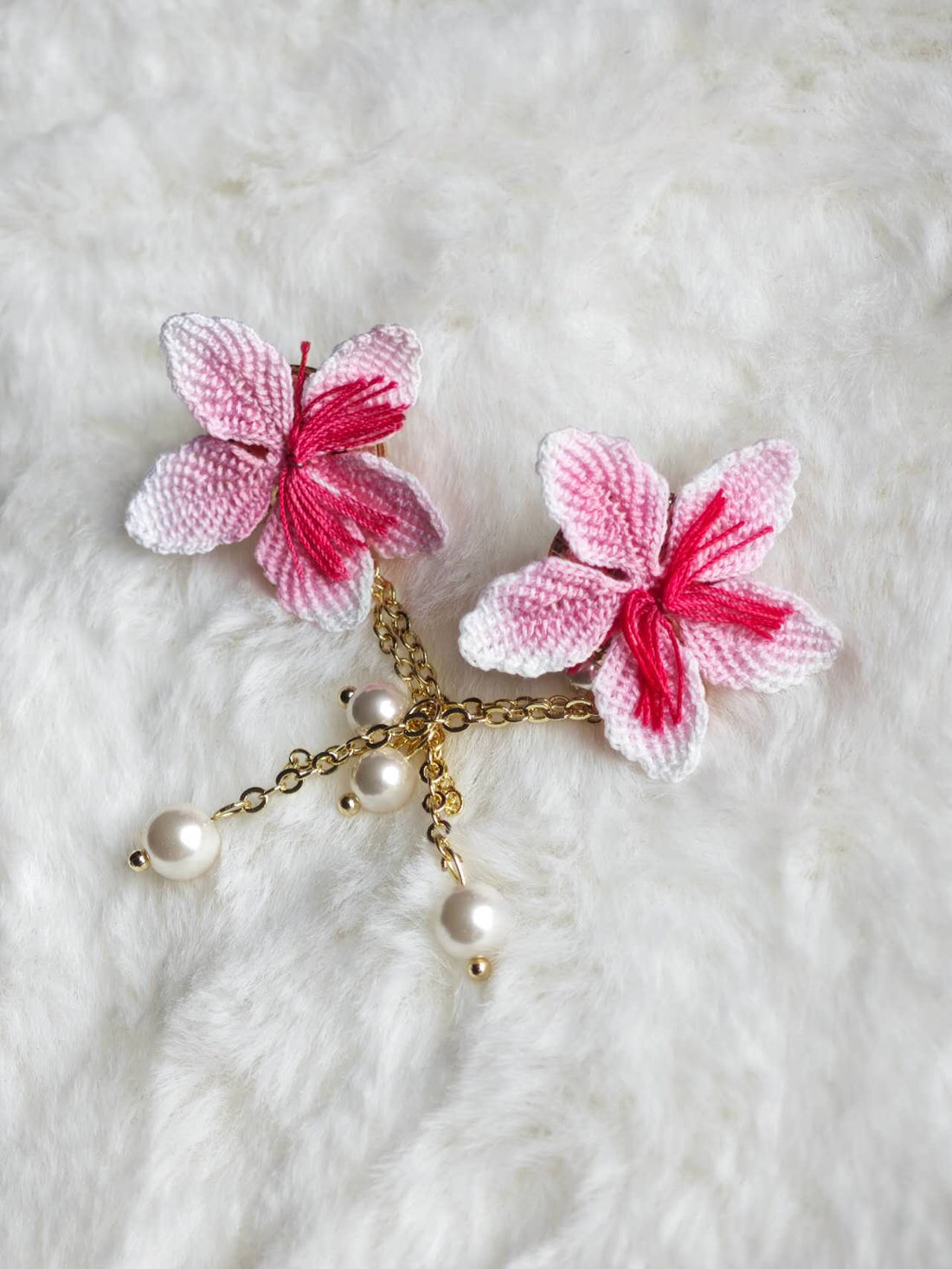 Handmade earrings with peach blossoms in micro-crochet