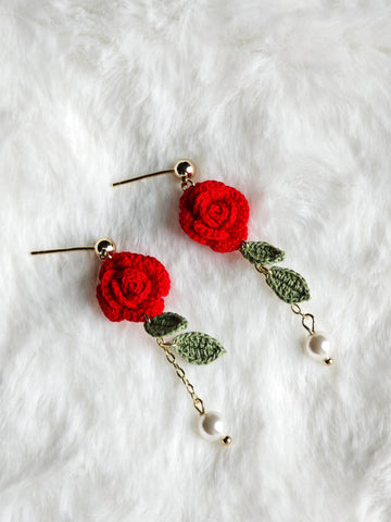 Handmade earrings with micro-crochet rose